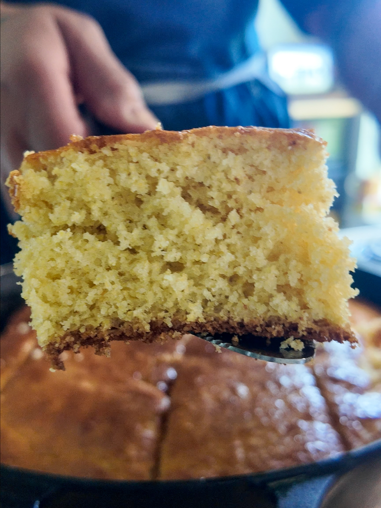 a slice of the cast iron honey butter cornbread