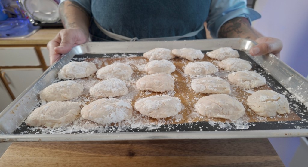 chicken nuggets formed and placed on a parchment lined baking sheet